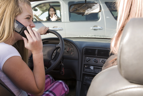 distracted driving accidents, distracted driving, car accident lawyer, Mogy Law Firm distracted driving accidents lawyer.