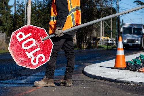 Construction Worker With Stop Sign