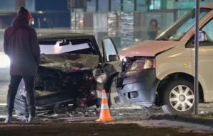 Van and car were severely wrecked in a roadside collision with a nearby bystander represent a case that a car accident lawyer would review.