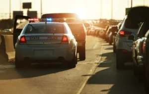Tennessee highway accident scene with emergency vehicles responding to collision caused by non-resident driver, illustrating interstate car crash complexity