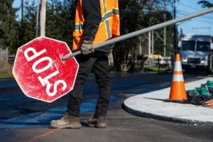 Construction Worker With Stop Sign